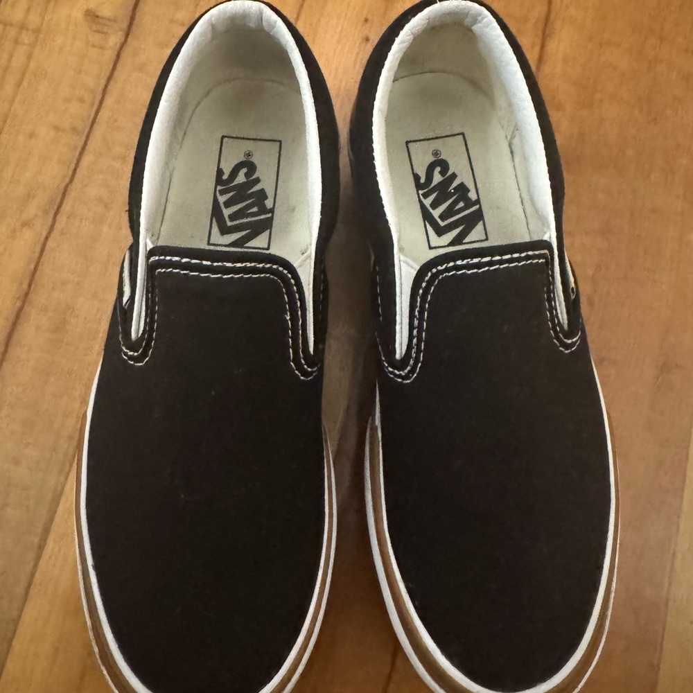 Black platform women’s Vans Slip-On Shoes